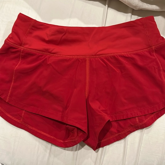 lululemon athletica Pants - Lululemon red speed ups low rise size 0